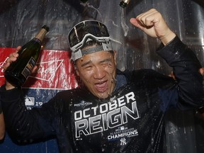 New York Yankees  Masahiro Tanaka is doused with champagne after the New York Yankees clinched the American League East division title at Yankee Stadium on Sept. 19, 2019 in Bronx borough of New York City. (Elsa/Getty Images)