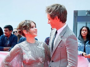Actors Felicity Jones (L) and Eddie Redmayne attend 'The Aeronauts' premiere at the Roy Thompson Hall during the 2019 Toronto International Film Festival Day 4 on Sept. 8, 2019, in Toronto. (AFP Photo)