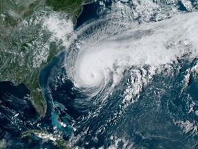 A satellite image of Hurricane Humberto, west of Bermuda, U.S., Sept. 17, 2019. NOAA/Handout via REUTERS