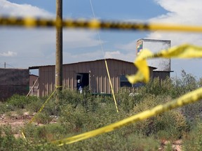 An FBI agent investigates the home of Seth Ator following the shooting he committed, according to the local police, in Odessa, Texas, U.S. September 1, 2019. REUTERS/Callaghan O'Hare