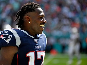 New England Patriots wide receiver Antonio Brown (17) looks on during the second half against the Miami Dolphins at Hard Rock Stadium. Mandatory Credit: Jasen Vinlove-USA TODAY