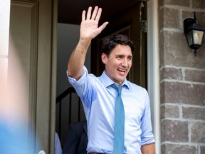 Justin Trudeau waves to supporters after speaking at an election campaign stop in Brampton Sept. 22, 2019.