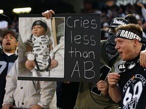 An Oakland Raiders fan holds up a sign about Antonio Brown during the game between the Denver Broncos and the Oakland Raiders at RingCentral Coliseum on September 9, 2019 in Oakland. (Lachlan Cunningham/Getty Images)