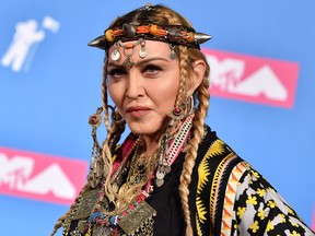 In this file photo taken on August 21, 2018 Madonna poses in the press room at the 2018 MTV Video Music Awards at Radio City Music Hall in New York City.