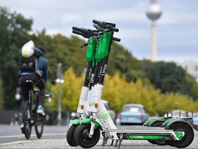 E-scooters are parked on the roadside on September 13, 2019 in Berlin. (JOHN MACDOUGALL/AFP/Getty Images)