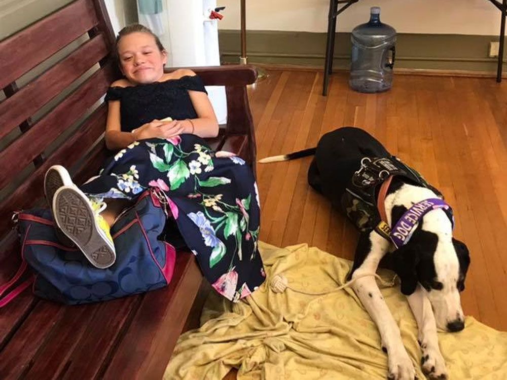 Teen with muscle wasting disease able to walk swim thanks to dog