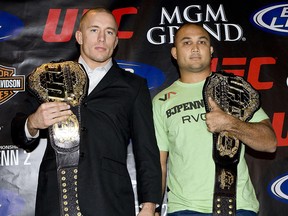 BJ Penn (right) poses with Georges St. Pierre at a presser for their UFC fight. (Postmedia file photo)