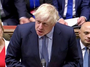Britain's Prime Minister Boris Johnson speaks in parliament, which reconvened after the UK Supreme Court ruled that his suspension of the parliament was unlawful, in London on Wednesday, Sept. 25, 2019, in this screen grab taken from video.