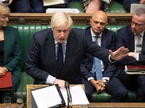 A handout photograph released by the UK Parliament shows Britain's Prime Minister Boris Johnson speaking in the House of Commons in London on Tuesday, Sept. 3, 2019.
