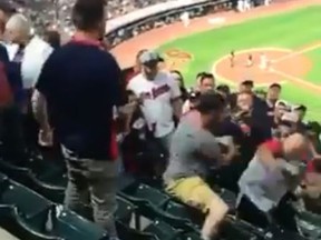 In a viral video, several fans brawl in the stands during a Cleveland Indians game this past Saturday. (Twitter)