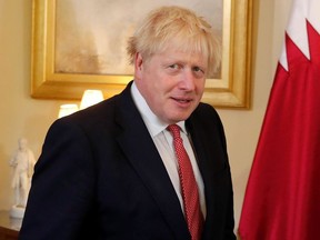 Britain's Prime Minister Boris Johnson meets with Qatar's Emir Sheikh Tamim bin Hamad Al Thani at Downing Street in London, Britain September 20, 2019.