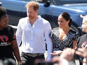 The Duke and Duchess of Sussex, Prince Harry and his wife Meghan, are welcomed to a Justice Desk initiative in Nyanga township, on the first day of their African tour in Cape Town, South Africa, September 23, 2019.