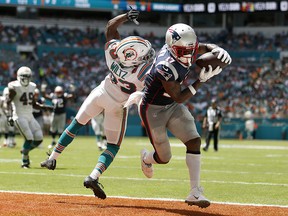 Antonio Brown of the New England Patriots scores a touchdown against the Miami Dolphins at Hard Rock Stadium on September 15, 2019 in Miami. (Michael Reaves/Getty Images)