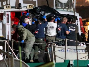 Rescue personnel return to shore with the victims of a pre-dawn fire that sank a commercial diving boat off the coast of  Santa Barbara, California, U.S., September 2, 2019.