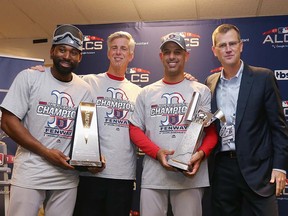 Boston Red Sox (from left) outfielder Jackie Bradley Jr., President of Baseball Operations Dave Dombrowski, manager Alex Cora, and President and CEO Sam Kennedy pose after the Boston Red Sox defeated the Houston Astros to advance to the World Series at Minute Maid Park on October 18, 2018 in Houston. (Elsa/Getty Images)