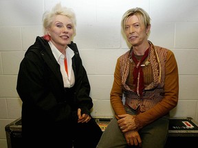 In this Nov. 17, 2003 file photo, Debbie Harry are David Bowie are seen before his concert as part of The Reality Tour at Manchester Evening News Arena in Manchester.