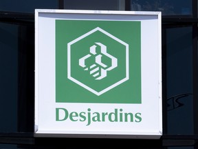 A Caisse populaire Desjardins sign is seen in Montreal on June 18, 2019.