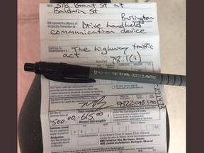 A driving instructor was given a distracted driving ticket after being caught on his phone in a Burlington school zone.