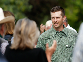 Edouard Maurice smiles outside court in Okotoks, Alberta, on June 22, 2018, after his charges were dropped.