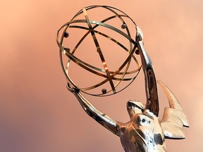 In this July 23, 2016, file photo, the Emmy statue is seen in front of the Television Academy during the red carpet for the 68th Los Angeles Emmy Awards in North Hollywood, Calif.