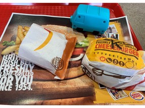A plastic toy is seen on a tray containing a child's cheeseburger meal in this photo illustration taken inside a Burger King restaurant in Manchester, Britain, September 19, 2019.