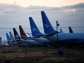 The tails of Boeing 737 MAX aircraft are seen parked at Boeing facilities at the Grant County International Airport in Moses Lake, Wash., Sept. 16, 2019.