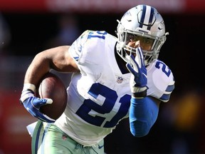 Dallas Cowboys running back Ezekiel Elliott rushes with the ball against the San Francisco 49ers during NFL action at Levi's Stadium in Santa Clara, Calif., on Oct. 22, 2017.