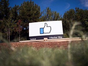 In this file photo taken on Nov. 4, 2016, a Facebook logo is seen in Menlo Park, Calif.