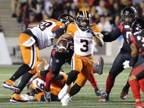 Running back John White IV of the B.C. Lions takes off with the ball during Saturday's CFL action against the Redblacks in Ottawa. The Lions defeated the hosts and, for the first time this season, have a two-game winning streak.