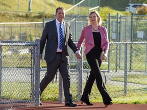 Conservative Leader Andrew Scheer and his wife Jill arrive to make a campaign announcement in Saint John, N.B. on Friday Sept. 20, 2019.