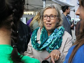 Green Party Leader Elizabeth May joins climate change activists and students as they gather in Calgary for a protest and "die-in", on the steps of the Calgary Municipal Building in Calgary on Friday, Sept. 20, 2019. The Green party says anxiety about political instability and the looming climate crisis are placing new strains on the mental well-being of Canadians.