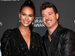 Robin Thicke (R) and April Love Geary attend the Pre-Grammy Gala  at The Beverly Hilton Hotel on Feb.  9, 2019 in Beverly Hills, Calif.  (Photo by /)