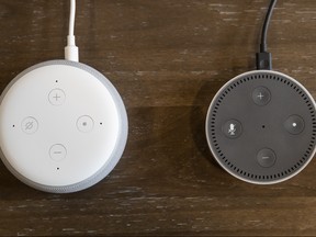 An updated "Echo Dot" (L) is pictured next to an older generation "Echo Dot" at Amazon Headquarters, following a launch event, on September 20, 2018 in Seattle Washington. Amazon launched more than 70 Alexa-enabled products during the event.