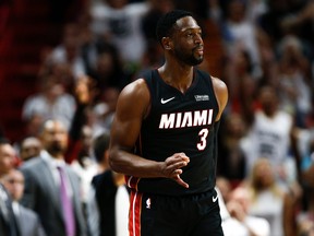 Dwyane Wade of the Miami Heat reacts after a three pointer against the Charlotte Hornets during the second half at American Airlines Arena on Oct. 20, 2018 in Miami. (Michael Reaves/Getty Images)