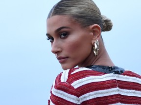 U.S. model Hailey Baldwin arrives for the Saint Laurent Men's Spring-Summer 2020 runway show in Malibu, California, on June 6, 2019.