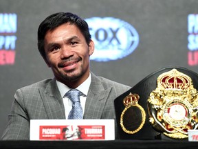 WBA welterweight champion Manny Pacquiao smiles as he listens during a news conference at MGM Grand Garden Arena on July 17, 2019 in Las Vegas, Nevada. (Ethan Miller/Getty Images)
