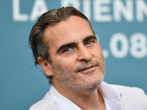 Joaquin Phoenix attends a photocall for the film "Joker" on Aug. 31, 2019 presented in competition during the 76th Venice Film Festival at Venice Lido. (ALBERTO PIZZOLI/AFP/Getty Images)