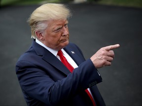 U.S. President Donald Trump speak to members of the press at the White House before departing on September 9, 2019 in Washington, DC.