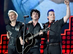 Mike Dirnt, left, Billie Joe Armstrong, centre, and Tre Cool of Green Day perform onstage during the 2017 Global Citizen Festival: For Freedom. For Justice. For All. in Central Park on Sept. 23, 2017 in New York City.  (Theo Wargo/Getty Images for Global Citizen)