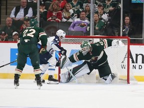 Winnipeg Jets defenseman Josh Morrissey (44) scores against Minnesota Wild goalie Devan Dubnyk (40) during overtime at Xcel Energy Center.