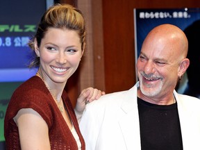 American actress Jessica Biel (L) shares a light moment with director Rob Cohen at a press conference of their latest movie "Stealth" at a Tokyo hotel, 14 September 2005.  The movie will be screaned in Japan from 08 October.    (Yoshikazu TSUNO/Getty Images)