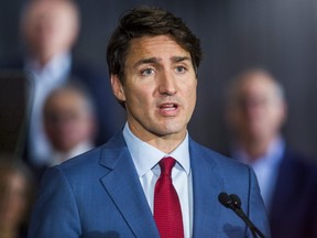 Federal Liberal leader Justin Trudeau, joined by MPs and Liberal candidates, makes an announcement in Toronto on Friday, Sept. 20, 2019