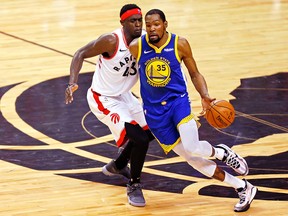 Golden State Warriors forward Kevin Durant (35) loses control of the ball while defended by Toronto Raptors forward Pascal Siakam (43) at Scotiabank Arena. (John E. Sokolowski-USA TODAY Sports)