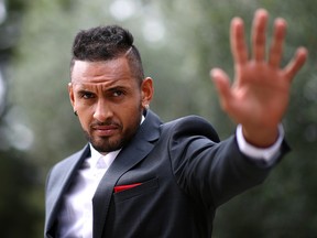 Nick Kyrgios acknowledges the fans as he arrives at Palais Eynard for the official welcome ceremony prior to the Laver Cup 2019 at Palexpo, on September 18, 2019 in Geneva, Switzerland. (Julian Finney/Getty Images for Laver Cup)