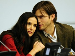 U.S. actress Demi Moore is seen with her then-husband, actor Ashton Kutcher, during the launch of a UN fund aimed at helping fight against human trafficking at the United Nations headquarters in New York, Nov. 4, 2011.