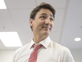 Prime Minister Justin Trudeau takes his leave after talking with staff at Carefirst Seniors and Community Services Association in Scarborough, Ont., on Wednesday, March 27, 2019. THE CANADIAN PRESS/Chris Young