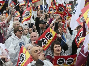 In this May 3, 2018, file photo, hundreds of members of the Public Service Alliance of Canada (PSAC) marched in a rally in Toronto.