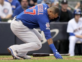 Addison Russell of the Chicago Cubs reacts after being hit by a pitch in the third inning against the Milwaukee Brewers at Miller Park on Sept. 8, 2019, in Milwaukee, Wis.