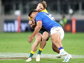 James O'Connor of the Wallabies is tackled by Motu Matuu of Samoa during their International Test match at Bankwest Stadium on September 7, 2019 in Sydney. (Mark Kolbe/Getty Images)