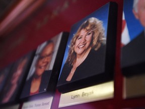 A picture of Senator Lynn Beyak accompanies other Senators official portraits on a display outside the Senate on Parliament Hill in Ottawa on Thursday, Sept. 21, 2017.